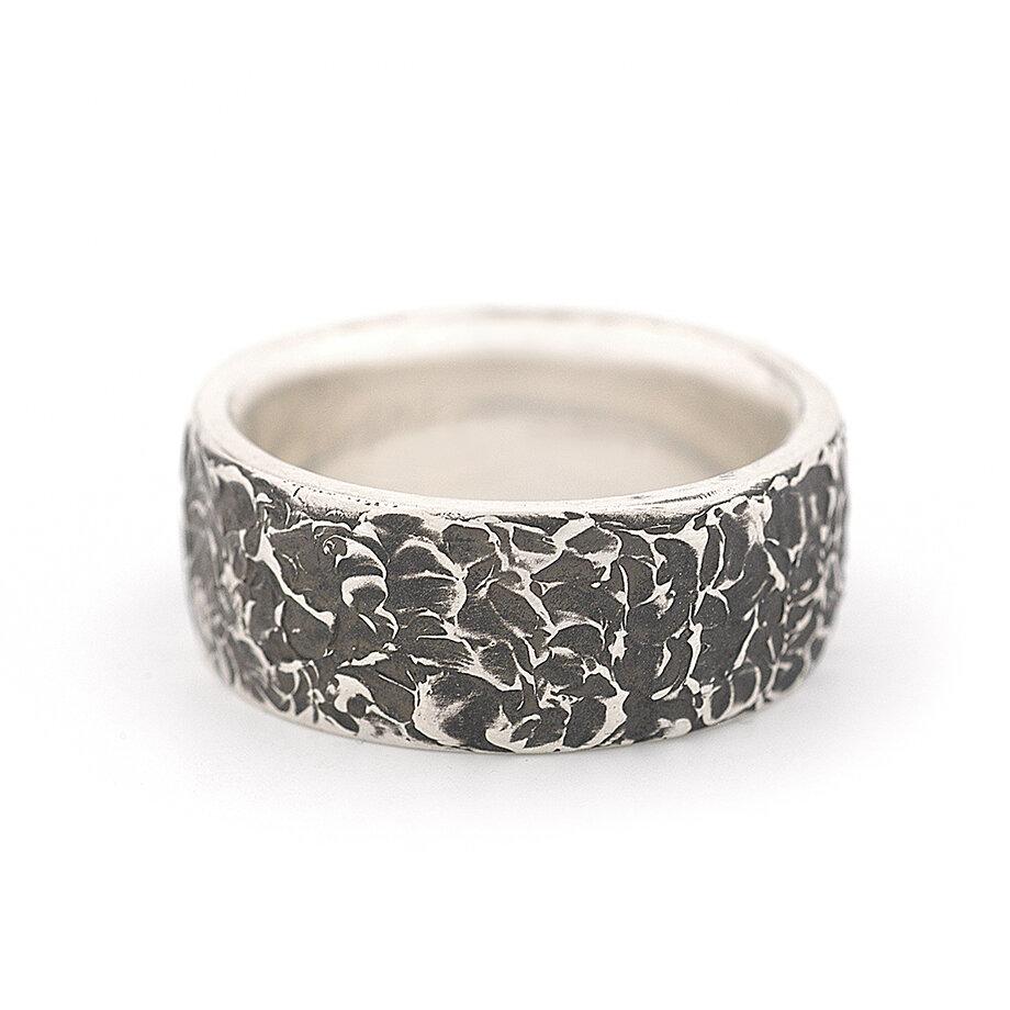 Forged silver ring with avocado texture