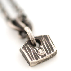 Sterling Silver Rectangular Tile with a Diamond