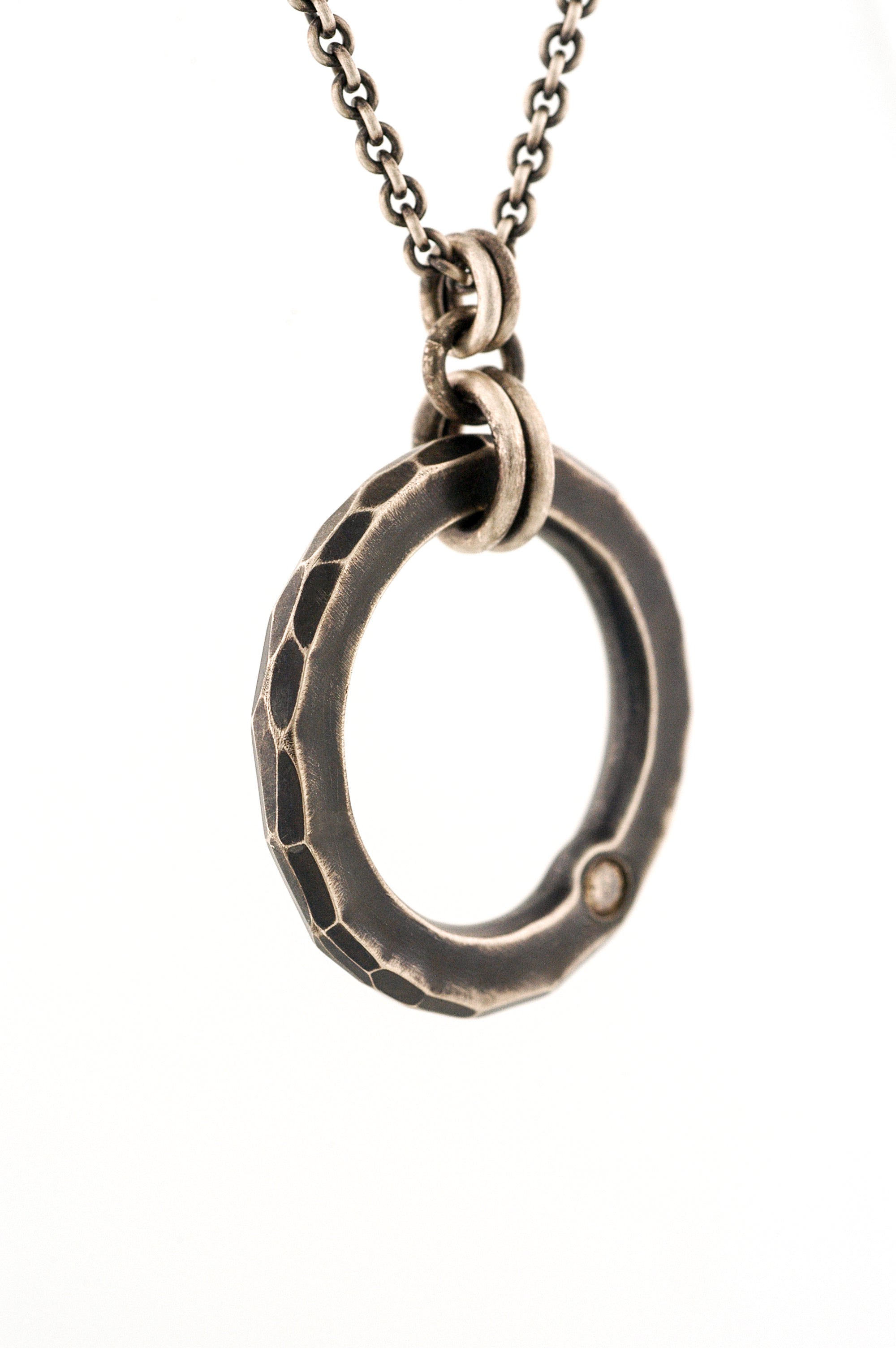 Sterling Silver Circle Pendant with a Champagne Diamond