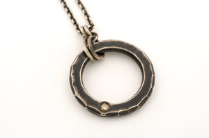 Sterling Silver Circle Pendant with a Champagne Diamond