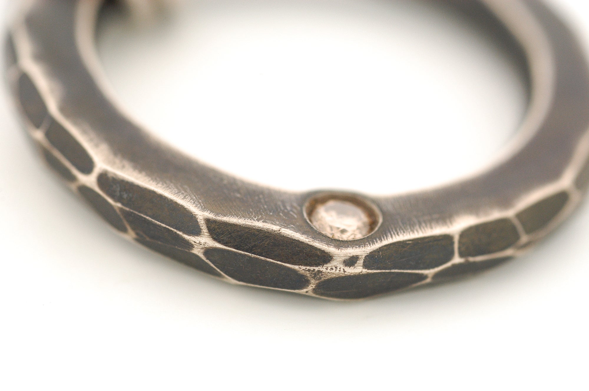 Sterling Silver Circle Pendant with a Champagne Diamond