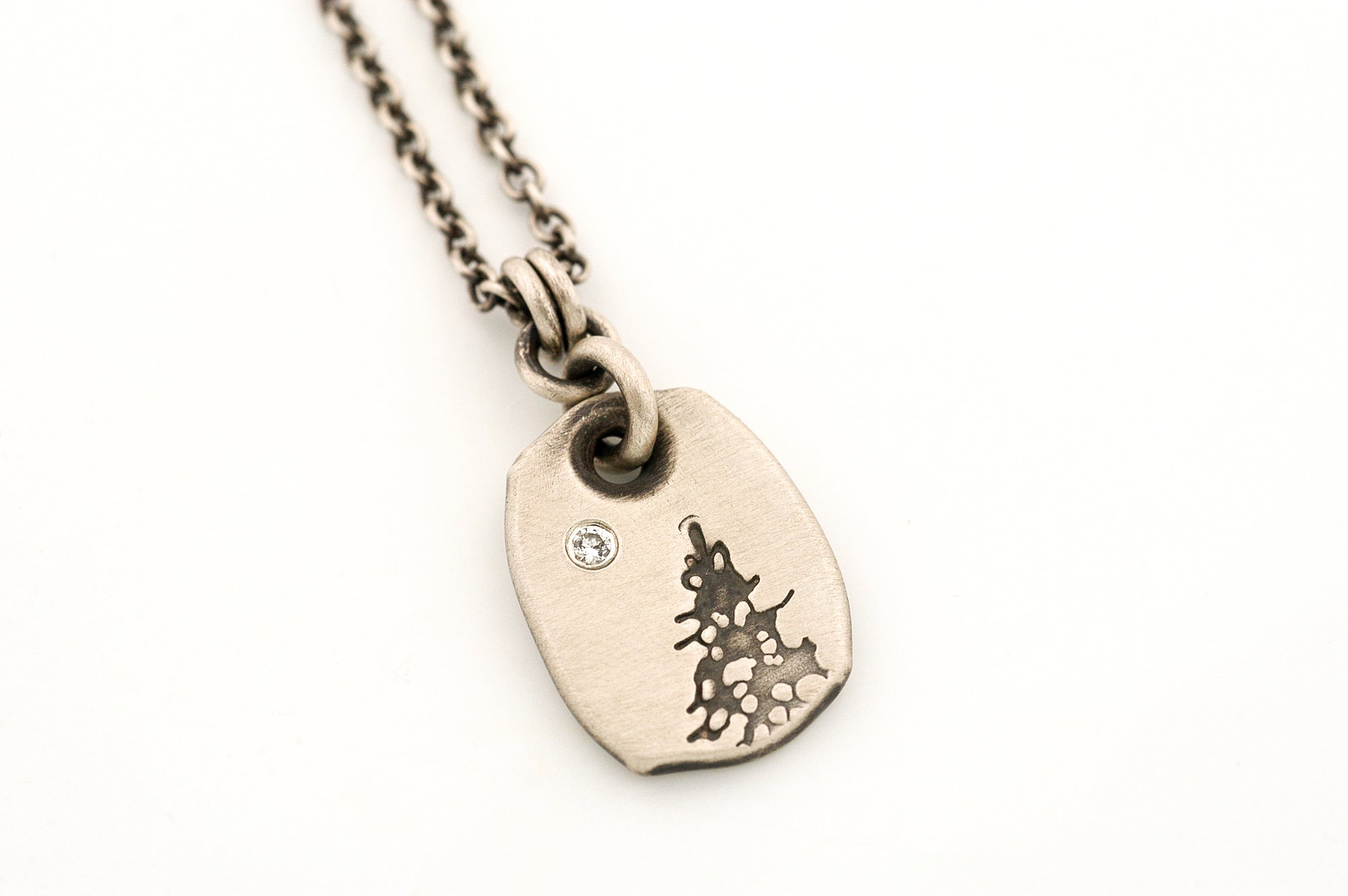 Sterling Silver Pendant with a Pine Tree and a Diamond