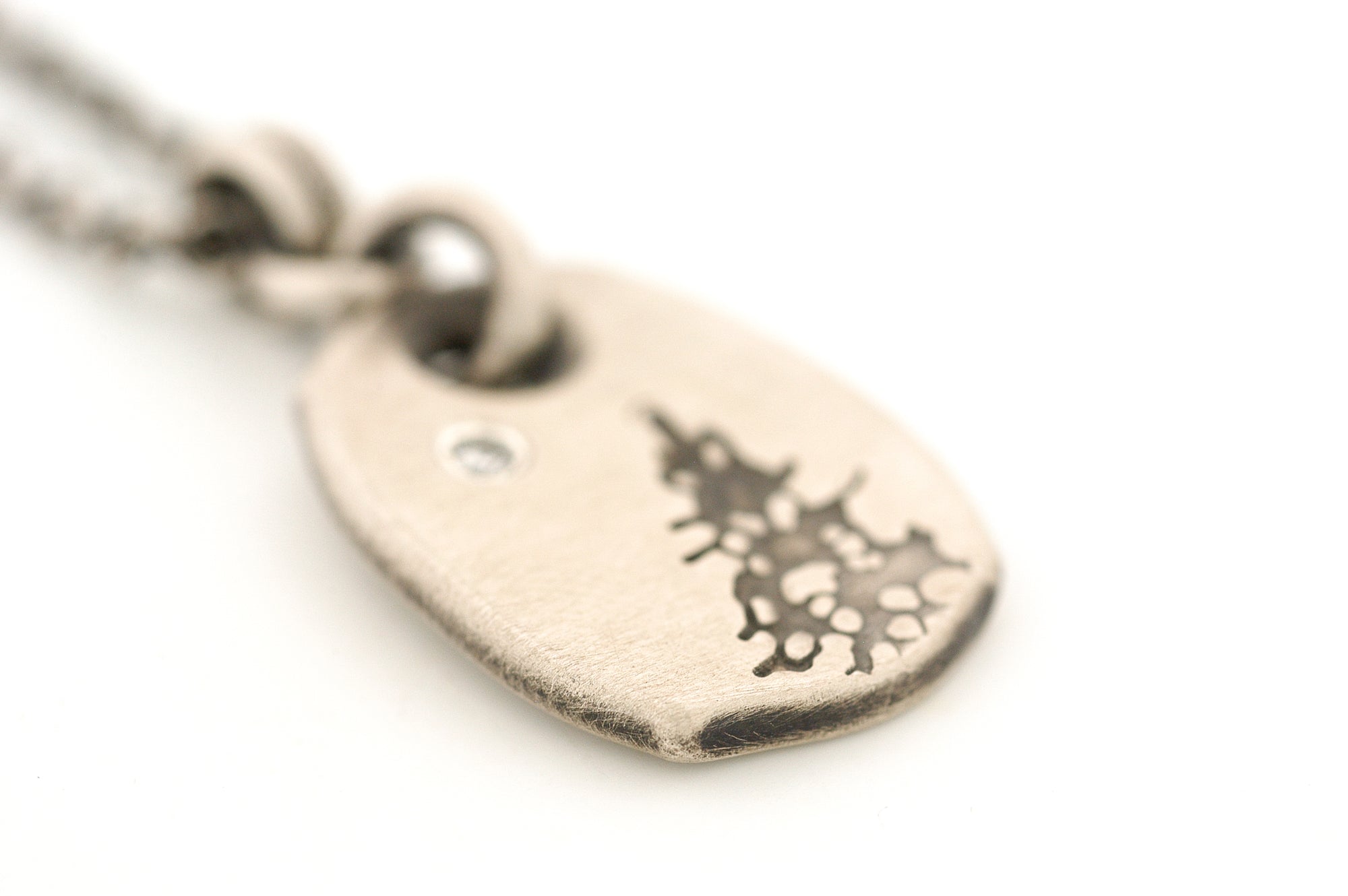 Sterling Silver Pendant with a Pine Tree and a Diamond