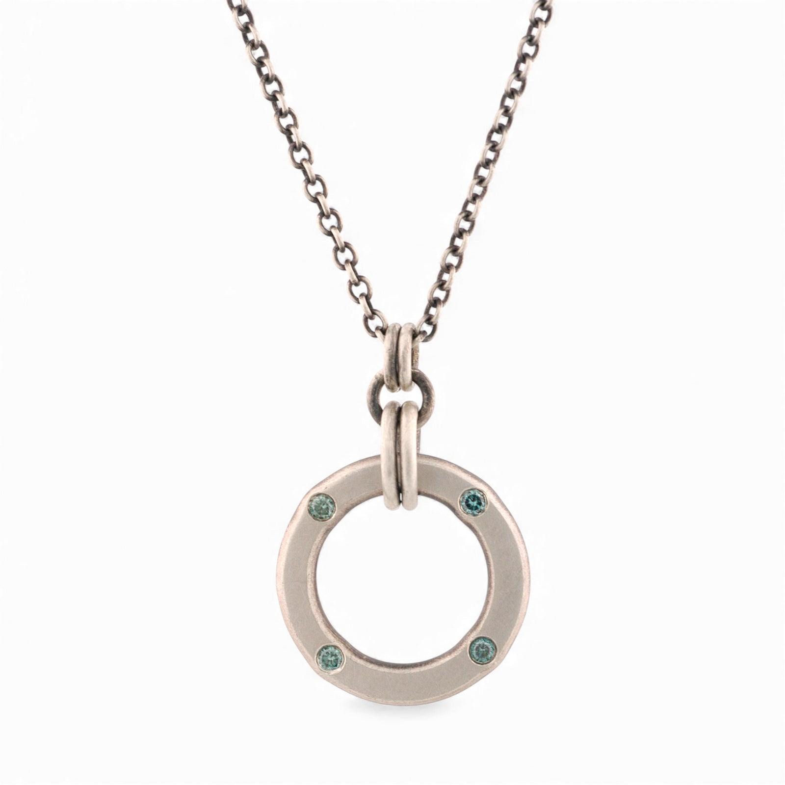 Sterling Silver Circle Pendant with Blue Diamonds