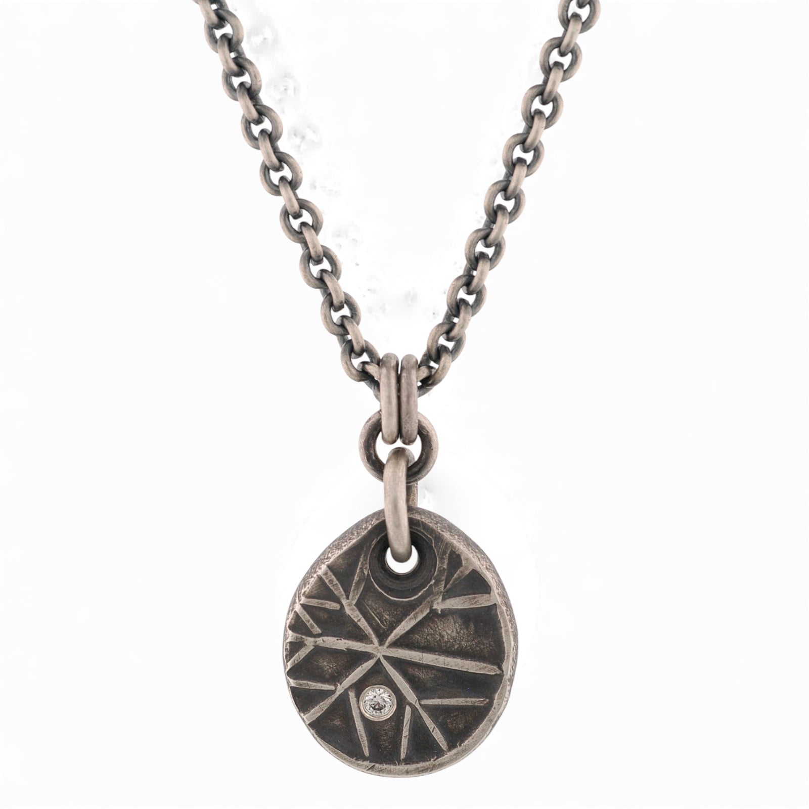 Sterling Silver Snowflake Pendant with a Diamond