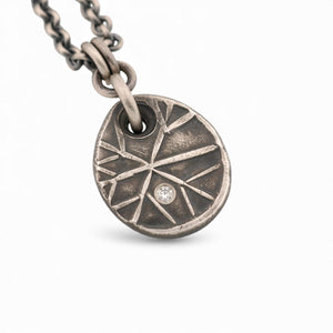 Sterling Silver Snowflake Pendant with a Diamond