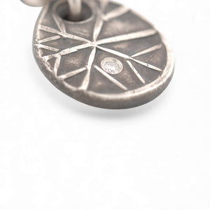 Sterling Silver Snowflake Pendant with a Diamond