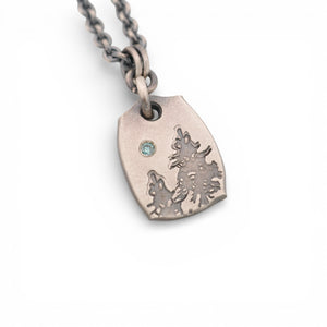 Sterling Silver Pendant with Pine Trees and a Blue Diamond