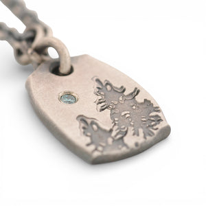 Sterling Silver Pendant with Pine Trees and a Blue Diamond