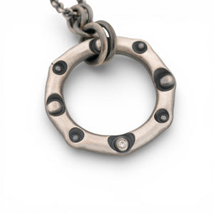 Sterling Silver Circle Pendant with a Diamond