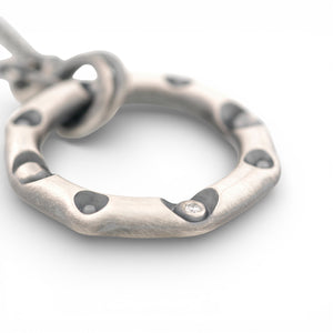 Sterling Silver Circle Pendant with a Diamond