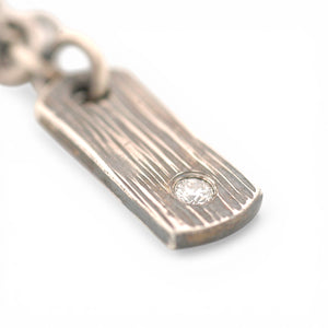 Sterling Silver Rectangular Vertical Pendant with a Diamond