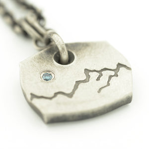 Sterling Silver with Mountain Range and Blue Diamond