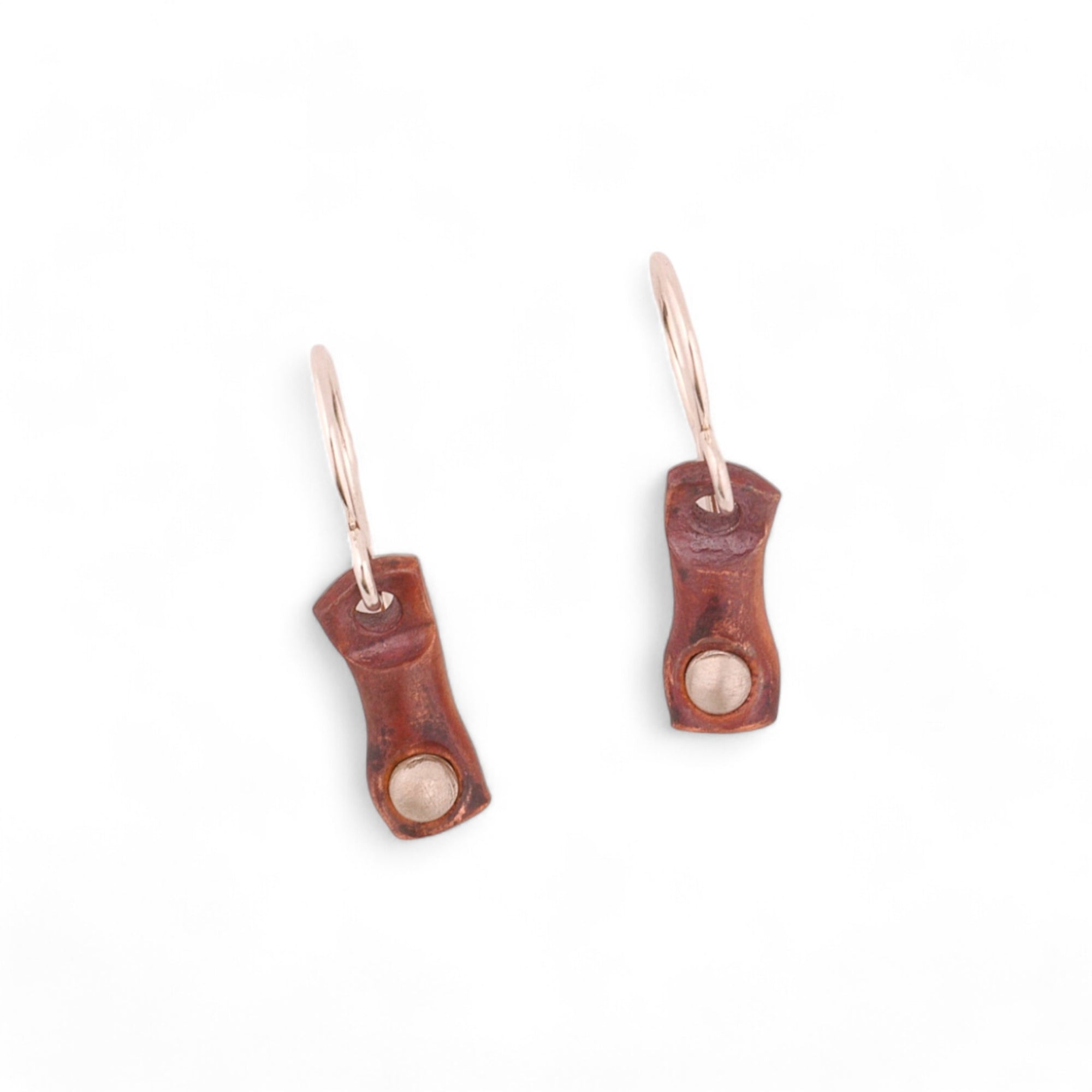 Elegant forged copper earrings with silver pearls