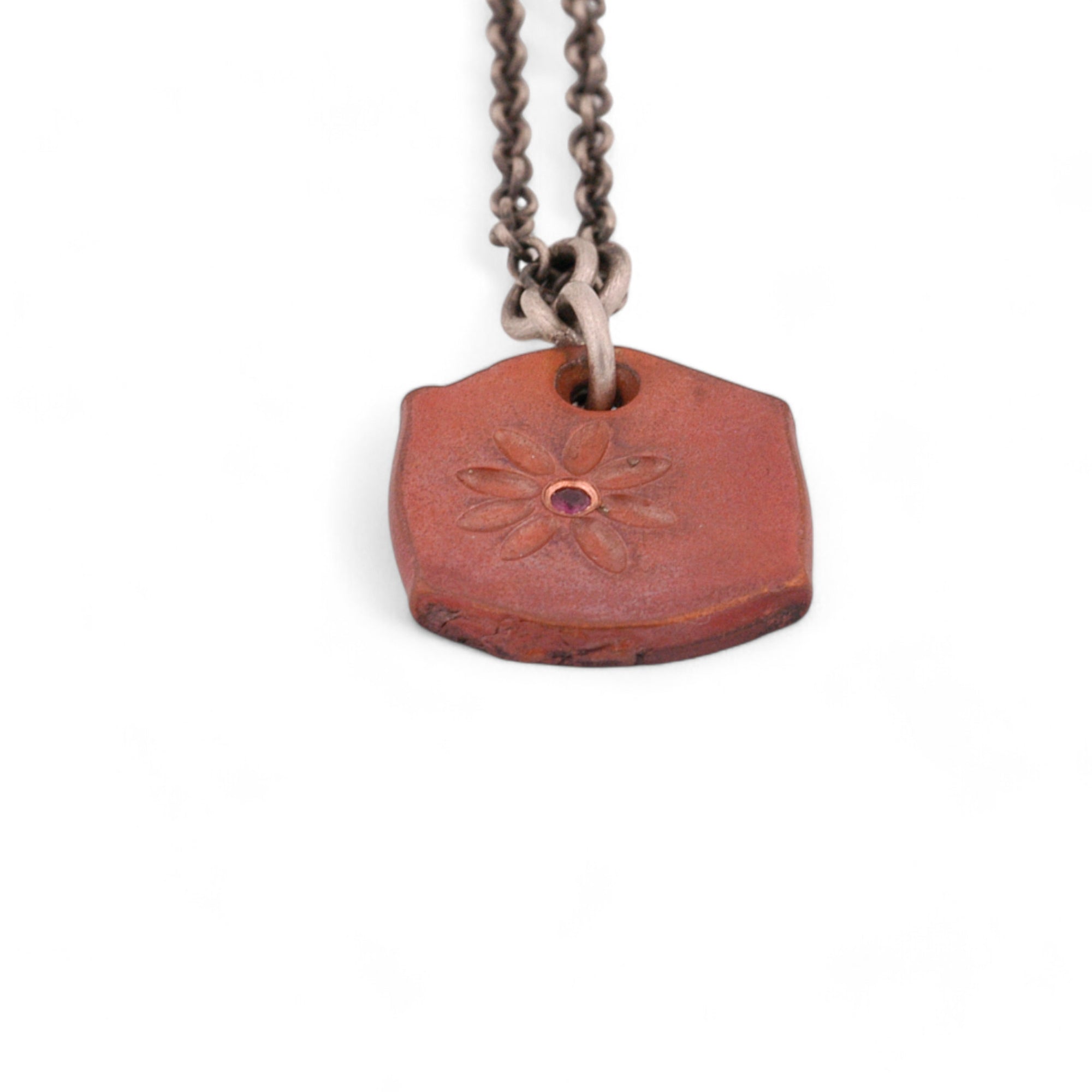 Copper Flower Tile Pendant with a Ruby