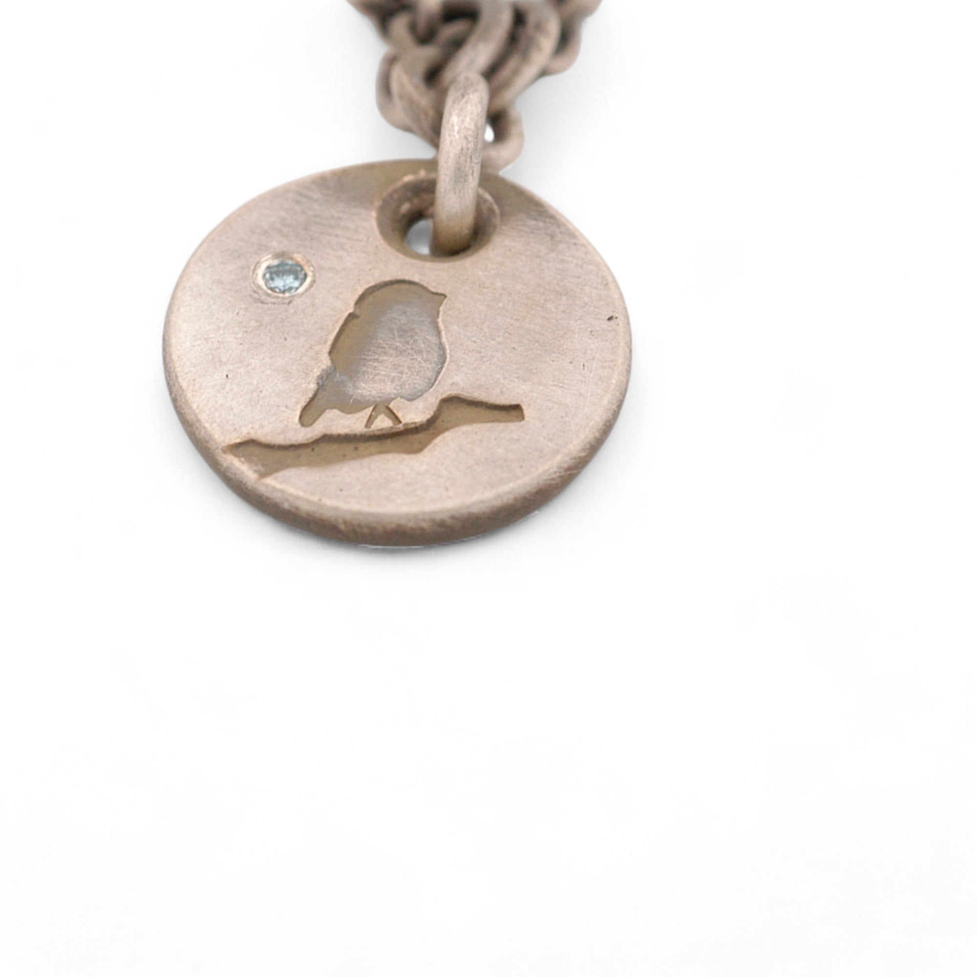 Bird on a Wire Pendant  with a Blue Diamond