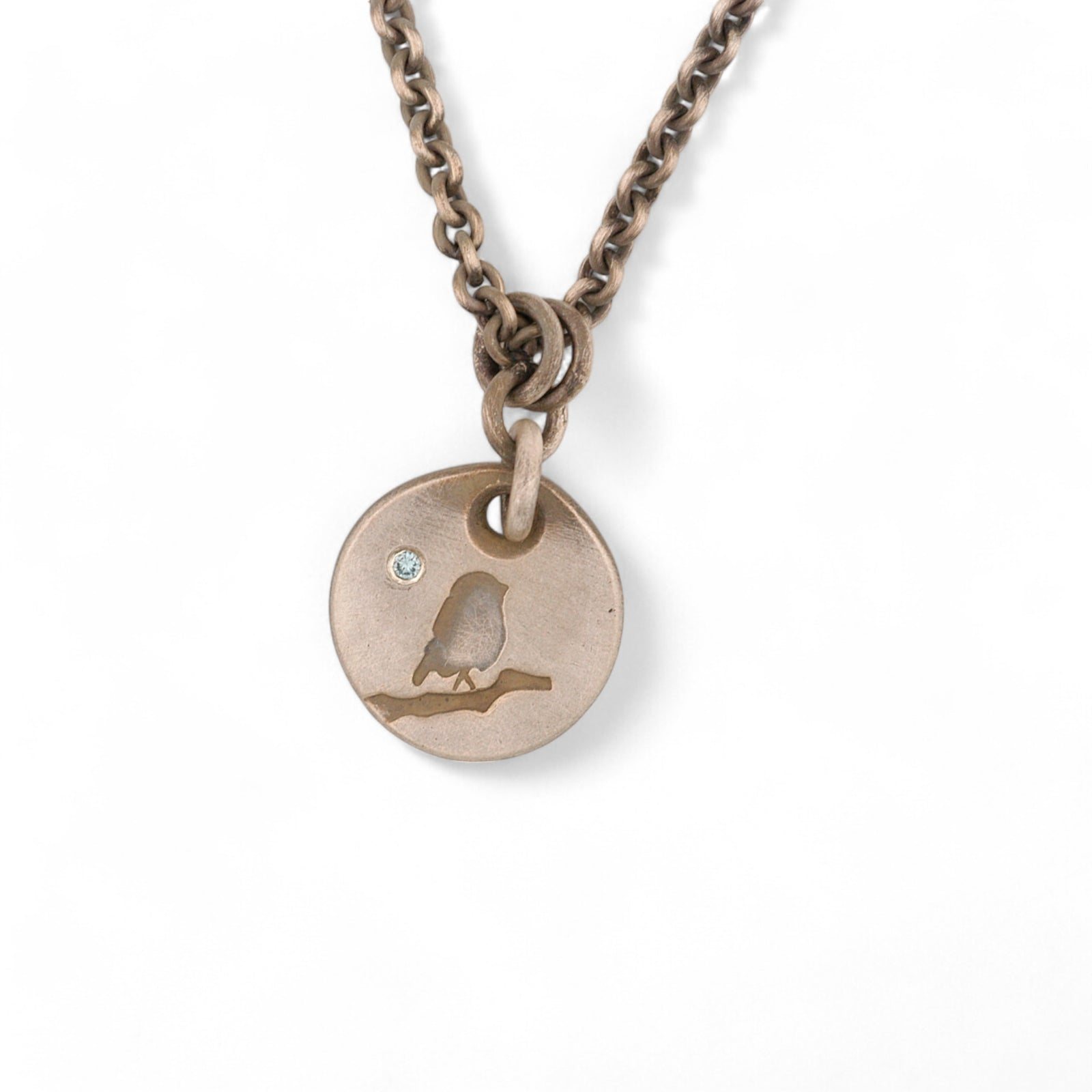 Little Birdie Pendant with a Blue Diamond