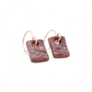 Vertical Copper Mountain Earrings with an Ideal Cut Diamond