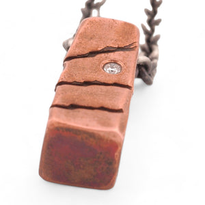 Iconic Solid Copper Pendant with a Brilliant Diamond