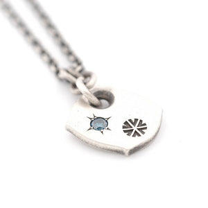 Stamped Snowflake Pendant with Blue Diamond
