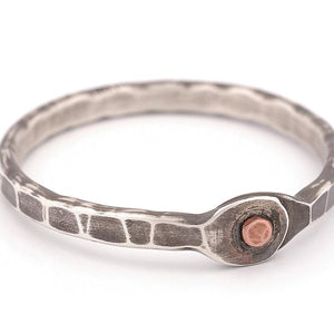 Textured cuff with copper rivet