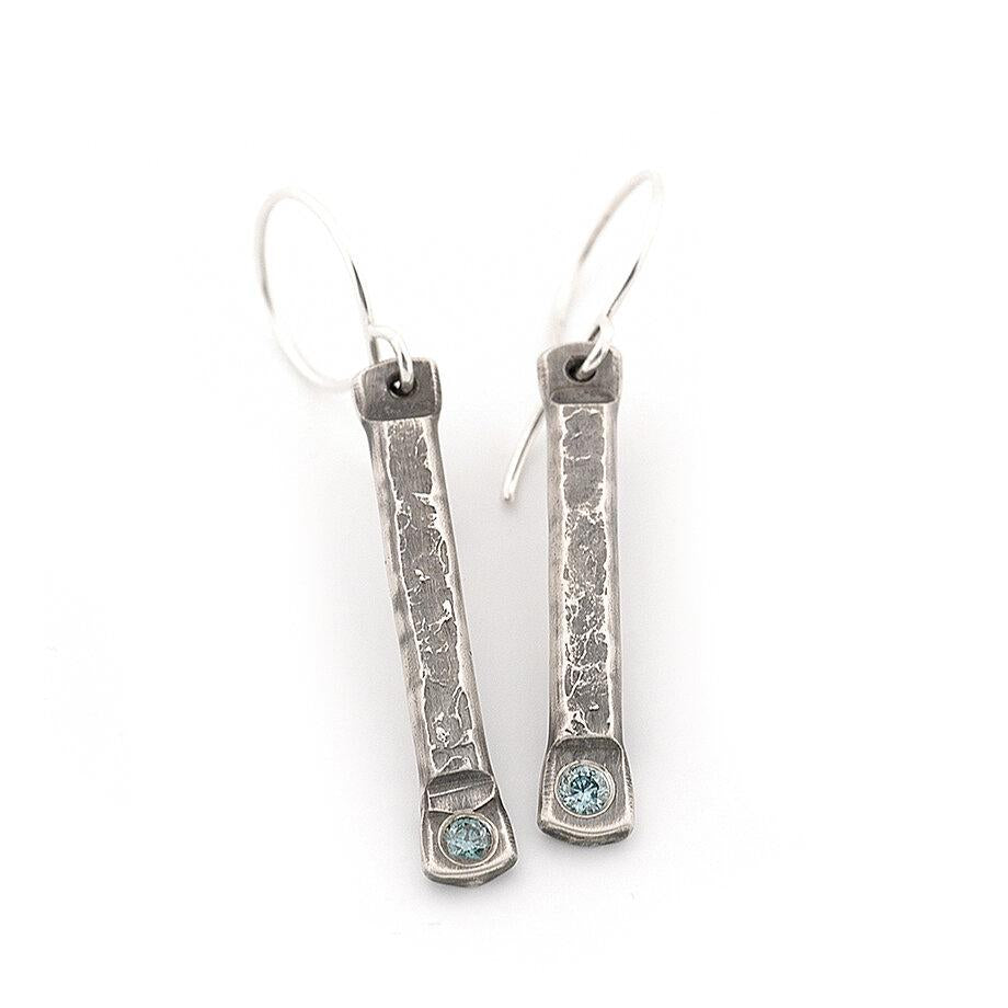 Sterling silver stick earrings with blue diamonds