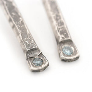 Sterling silver stick earrings with blue diamonds