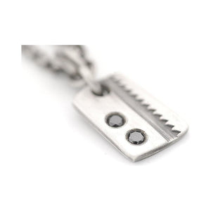 Stamped Saw Blade Pendant with Two Black Diamonds