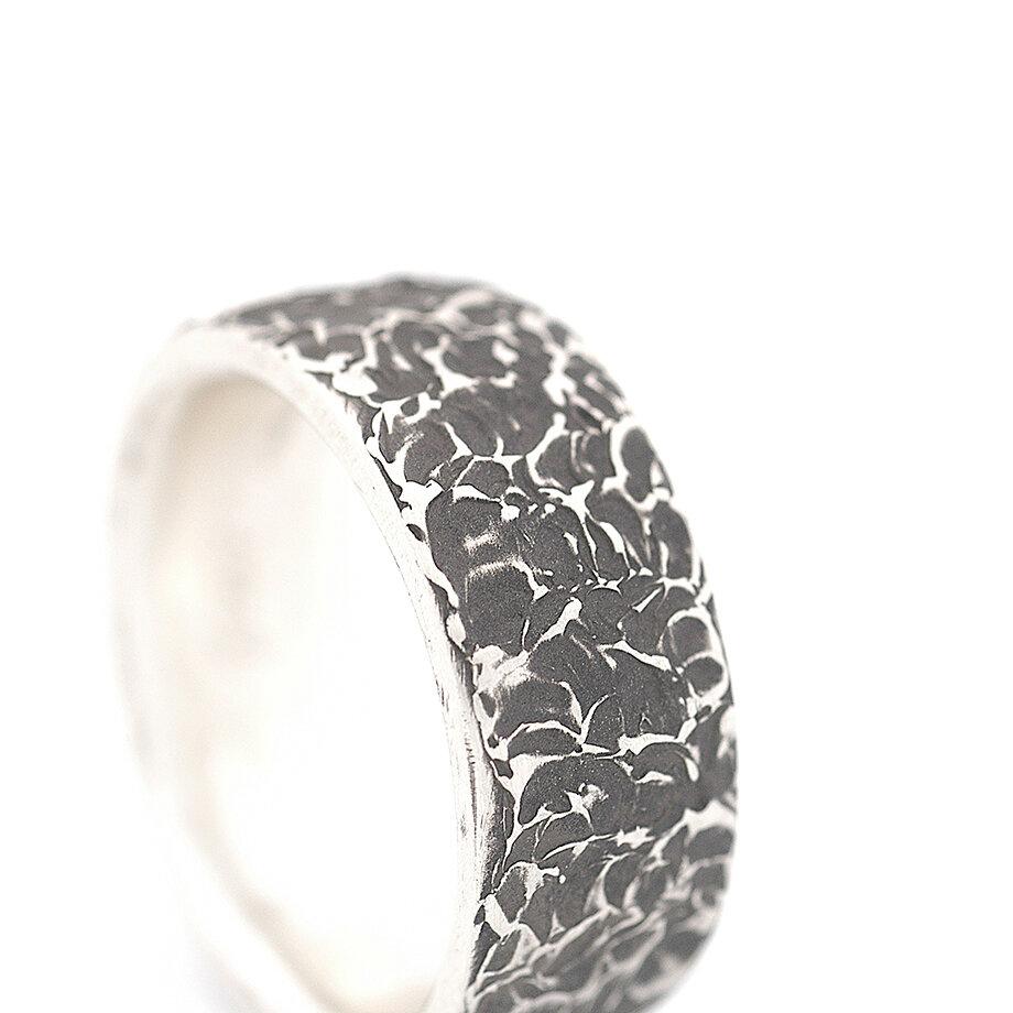 Forged silver ring with avocado texture